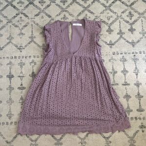 Mini dress with built in shorts. Has pockets.